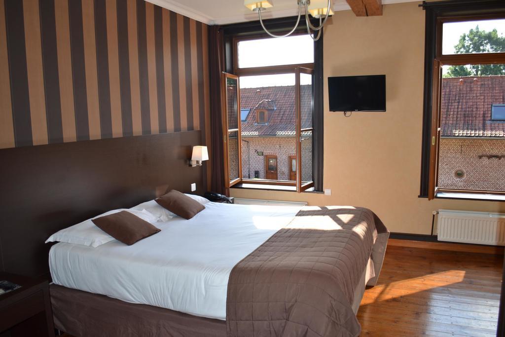 Le Domaine Des Cigognes Hotel Ennevelin Quarto foto