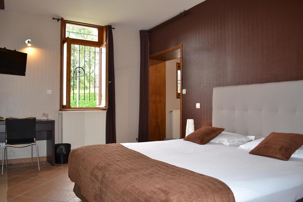 Le Domaine Des Cigognes Hotel Ennevelin Quarto foto