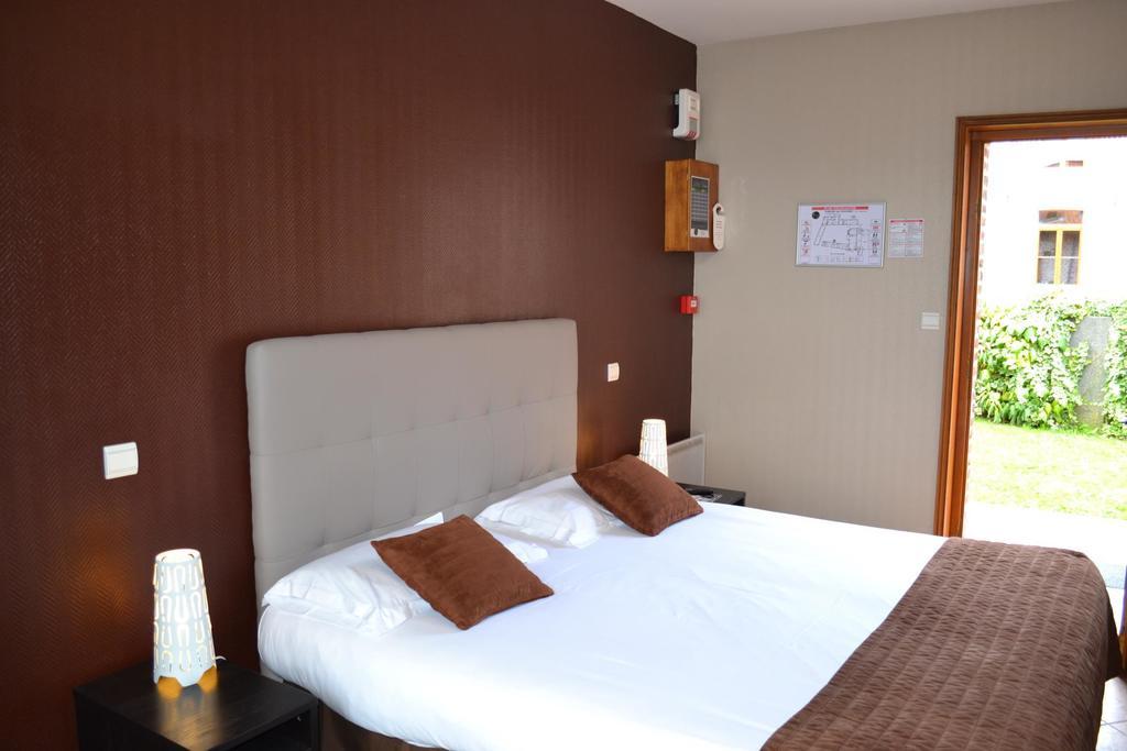 Le Domaine Des Cigognes Hotel Ennevelin Quarto foto