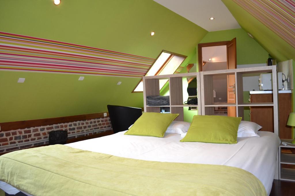 Le Domaine Des Cigognes Hotel Ennevelin Quarto foto