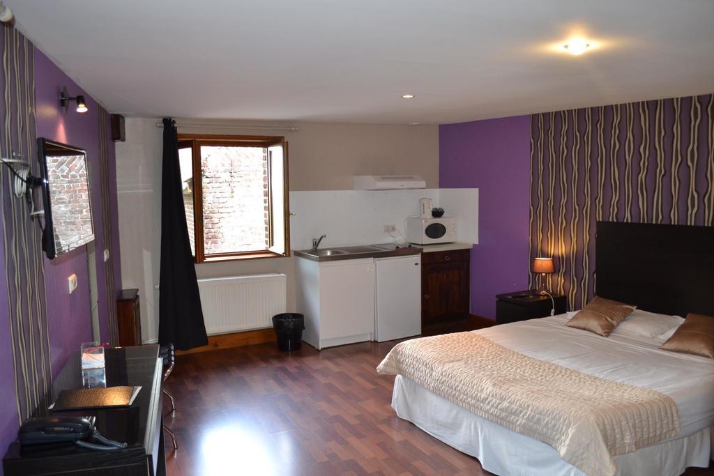 Le Domaine Des Cigognes Hotel Ennevelin Quarto foto