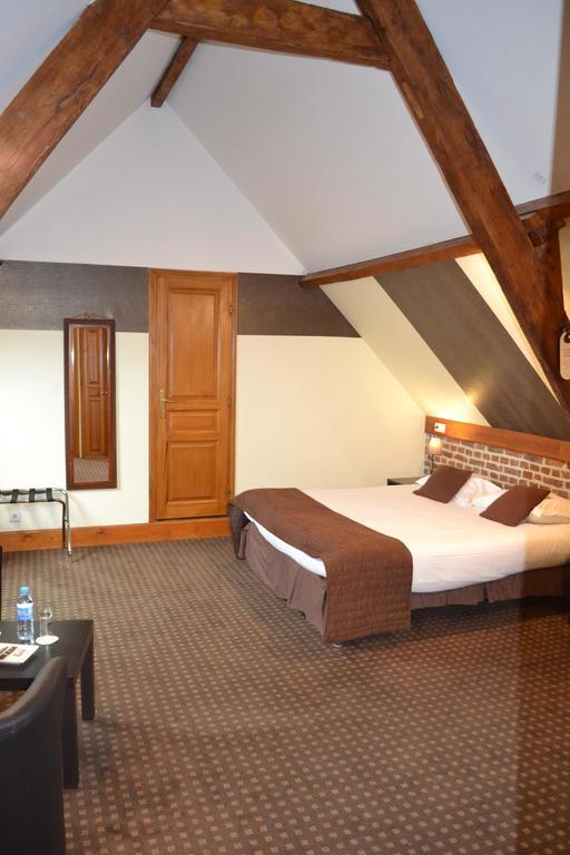 Le Domaine Des Cigognes Hotel Ennevelin Quarto foto