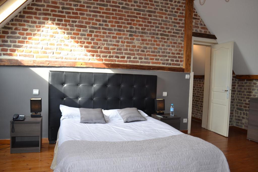Le Domaine Des Cigognes Hotel Ennevelin Quarto foto